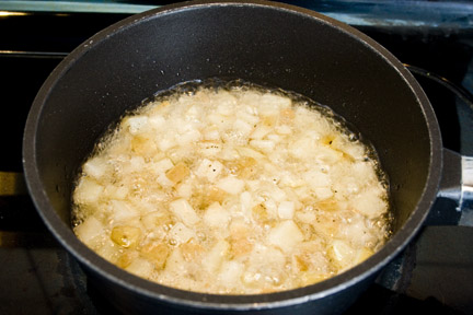 frying the potatoes